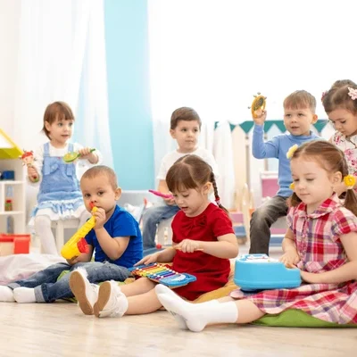 kindergarten-children-playing-different-musical-600nw-1284017200